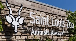 A sign on a stone wall  Description automatically generated with medium confidence