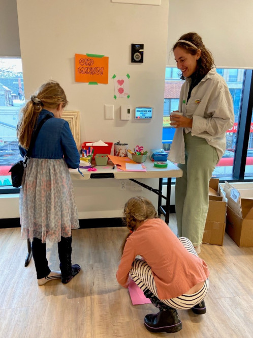 A family working on a craft.