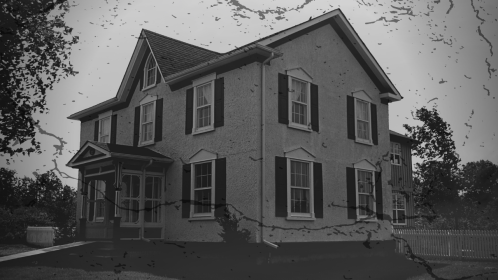 Black and white image of a spooky home