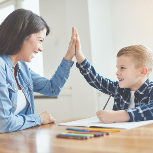 Parent and child doing a high five
